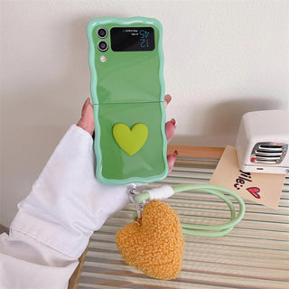 Auramma Collections Kawaii Soft Girl Aesthetic Wavy Edge Heart Purple Blue Green Orange Pink Matching Furry Heart Plush-Rope Wrist Charm Soft TPU Case Samsung Z Flip 6 5 4 3